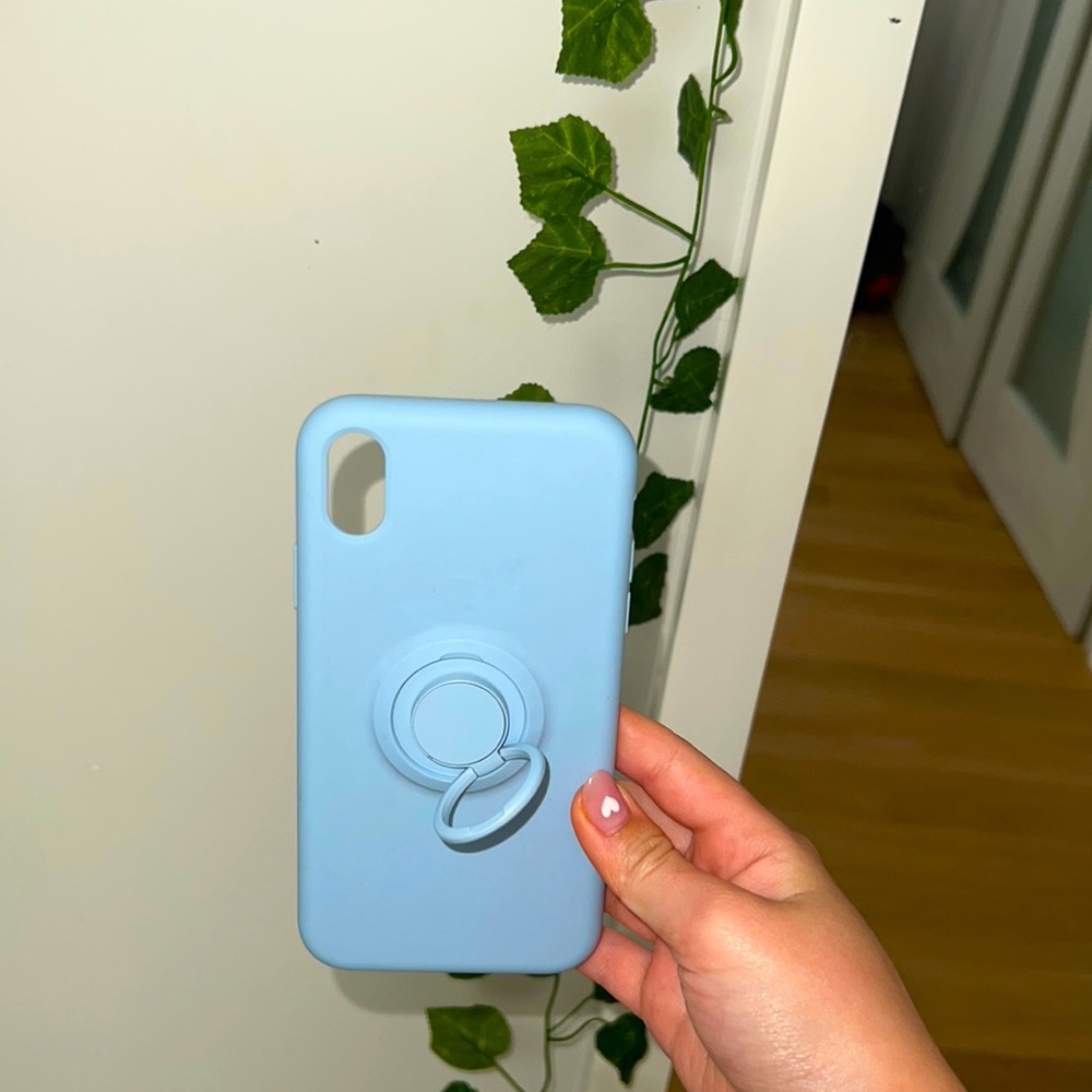 Soft protective baby blue iPhone XR case comes with a ring pop socket